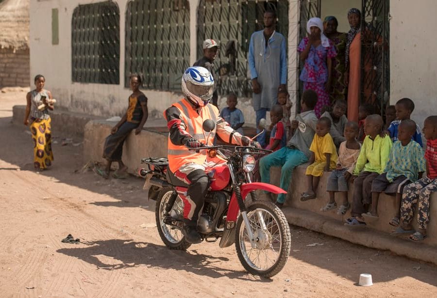 Healthworker on motorcycle - Basse The Gambia